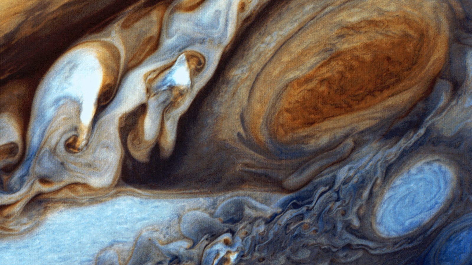Foto do grande ponto vermelho de Jupiter tirada pela sonda Voyager 1